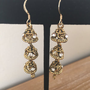 sparkly dangly gold and diamond earrings